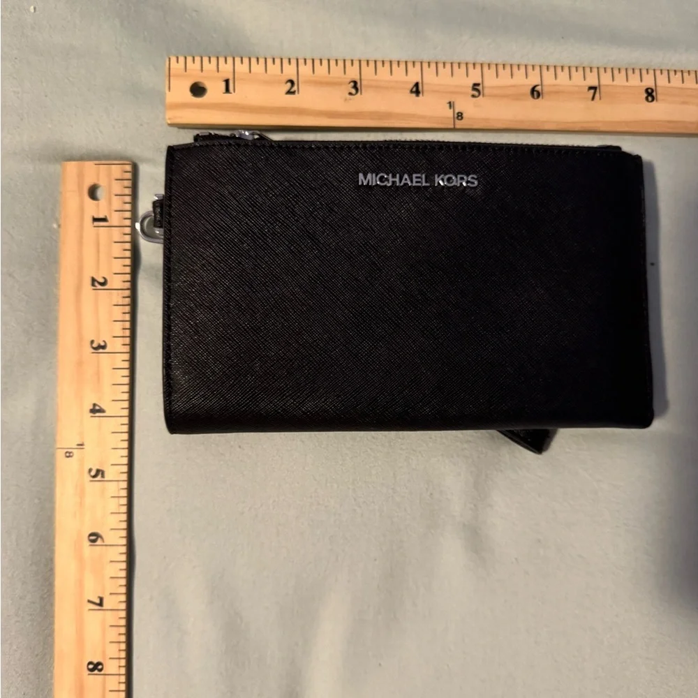 NWOT defect Michael Kors Black Wristlet